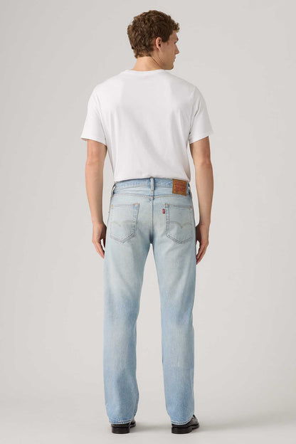Levi's light blue denim jeans back view, straight legs, five-pocket design