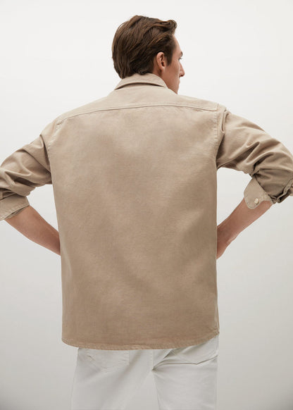 Beige men’s button-up shirt back view with collar and button placket.
