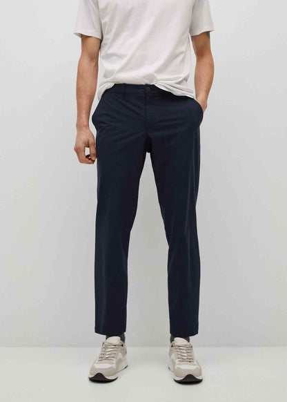 Dark navy tailored trousers with belt loops, zip fly, and tapered legs