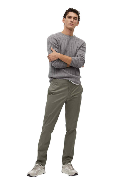 Khaki chino pants full view with tapered legs and zip fly.