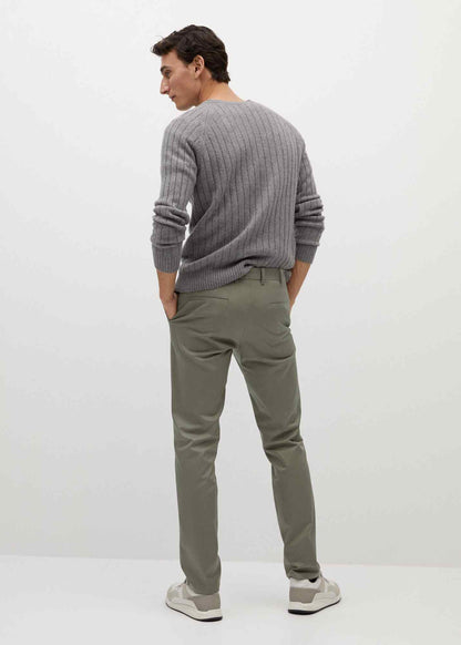 Khaki chino pants, back view with belt loops and straight leg fit.