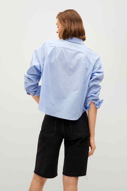 Sky blue button-front shirt, back view, pointed collar and long sleeves