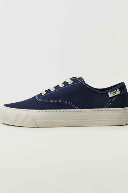 MANGO blue low-top lace-up sneakers with white rubber sole and contrast stitching
