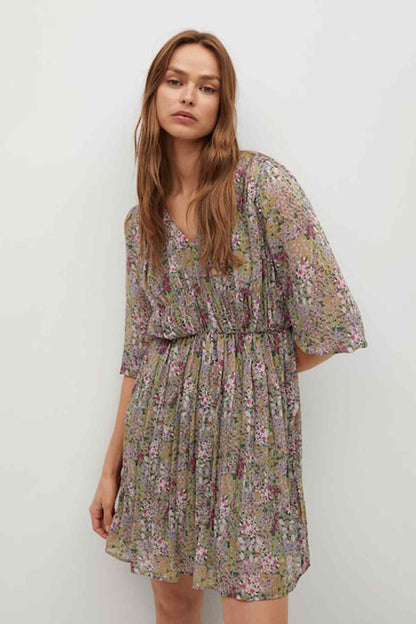 Green floral mini dress with V-neck and tiered, gathered waist