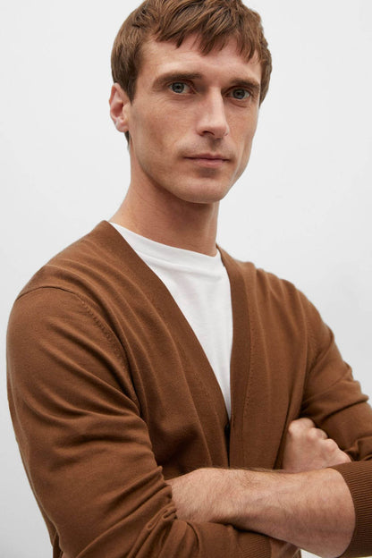 Brown V-neck cardigan close-up with button front and long sleeves