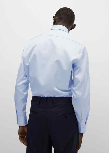 Light blue dress shirt back view, buttoned cuffs and pointed collar