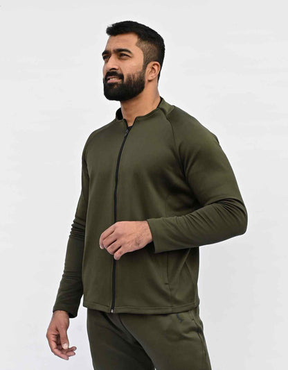 Bodybrics men's olive zip-up jacket and matching pants set, front view with hands clasped
