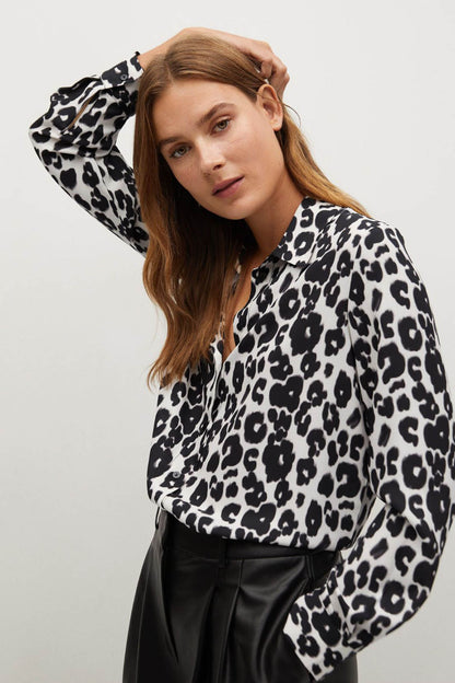 Black-and-white leopard-print button-up blouse with collar and long sleeves