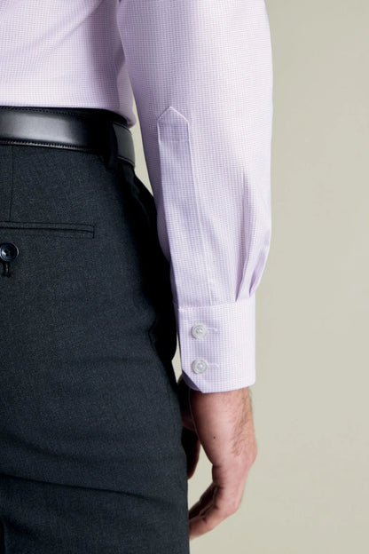 Purple dress shirt cuff with button fastening and pleated sleeve