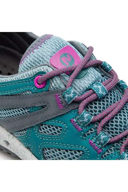 Teal mesh sneaker close-up with purple laces, padded collar, stitched overlays