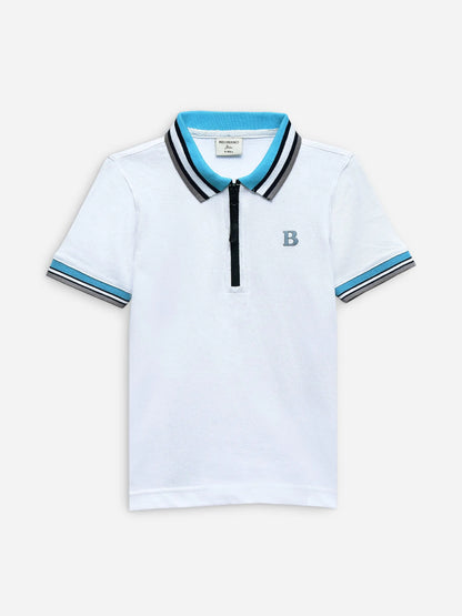 White cotton polo shirt with turquoise collar, black trim, striped cuffs, front B logo