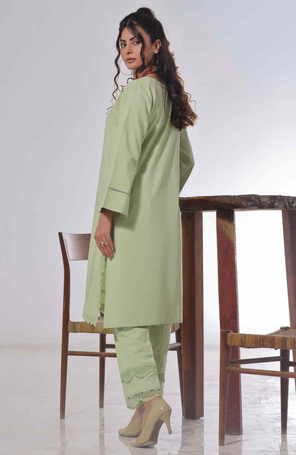 Light green tunic and pants set, side view with lace-trimmed cuffs