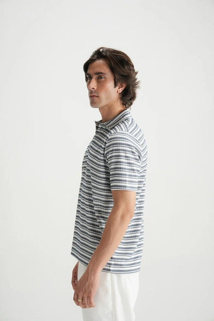 Mens striped polo shirt in blue and white with short sleeves and ribbed cuffs
