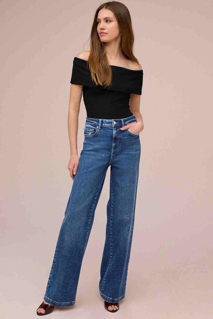 Dark blue wide-leg denim jeans with button and zipper fly