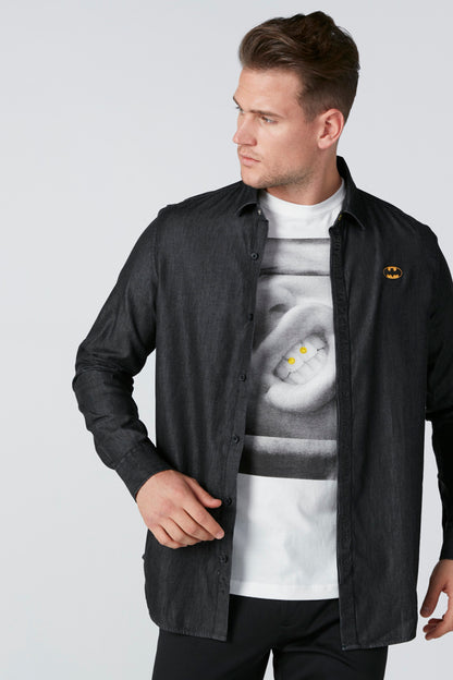 Black button-front shirt jacket, chest logo and seam detail