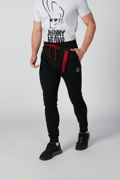 Men's black jogger pants with red drawstring and yellow logo patch