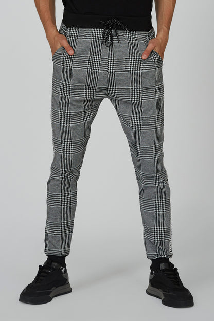 Gray plaid jogger pants with elastic waistband and drawstring