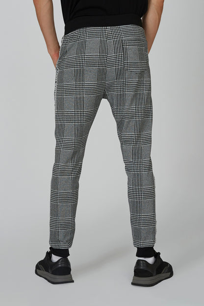 Gray plaid jogger pants with tapered legs and drawstring waist