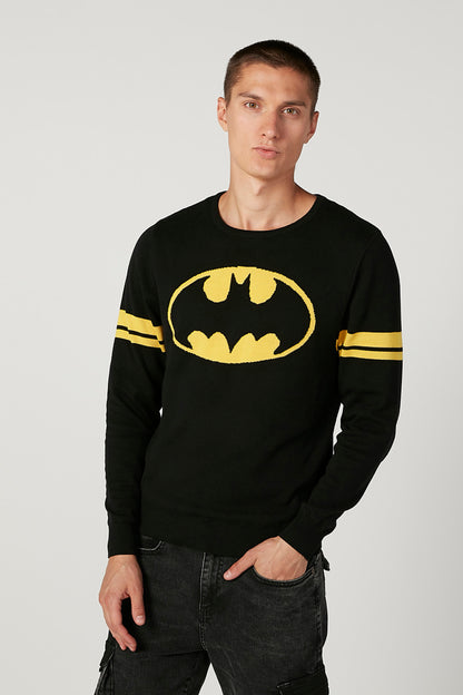 Black long-sleeve graphic sweatshirt with yellow bat logo and striped cuffs