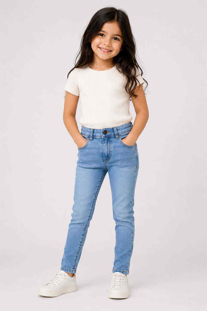 Kids blue denim jeans with cuffed hems, button fly, and belt loops