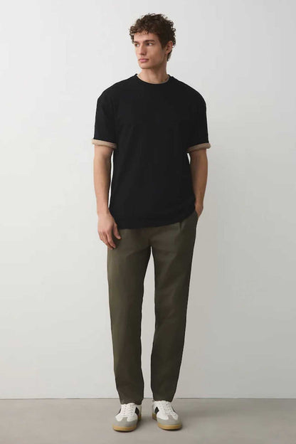 Men's black short-sleeve T-shirt and khaki green straight-leg trousers