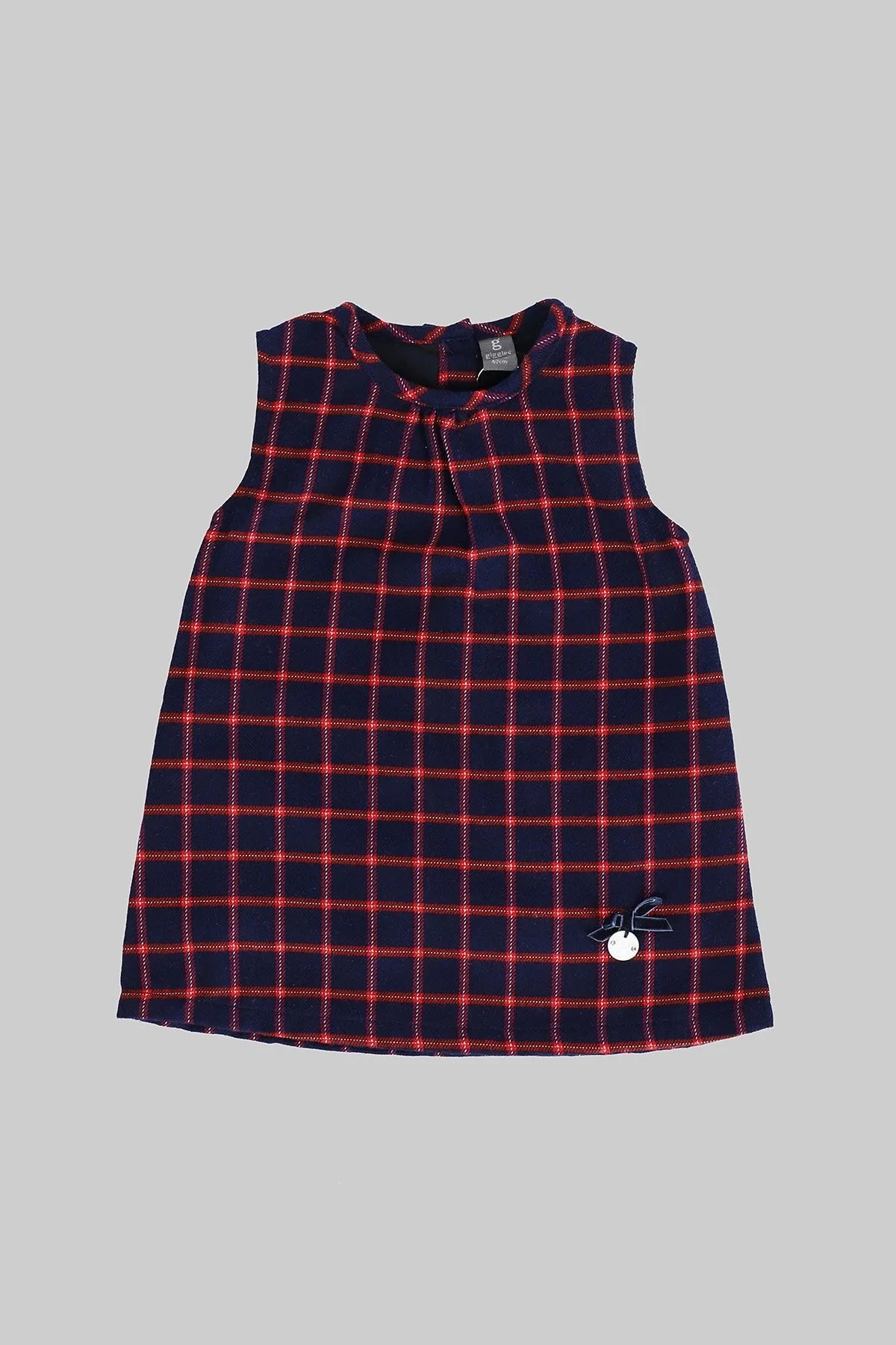 Baby plaid dress in navy with red grid pattern and small chest button detail