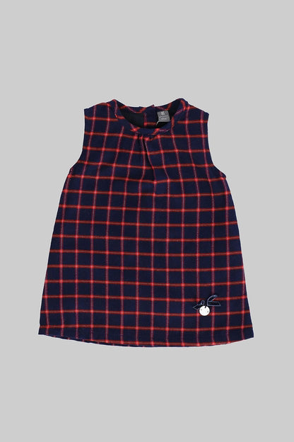 Baby plaid dress in navy with red grid pattern and small chest button detail