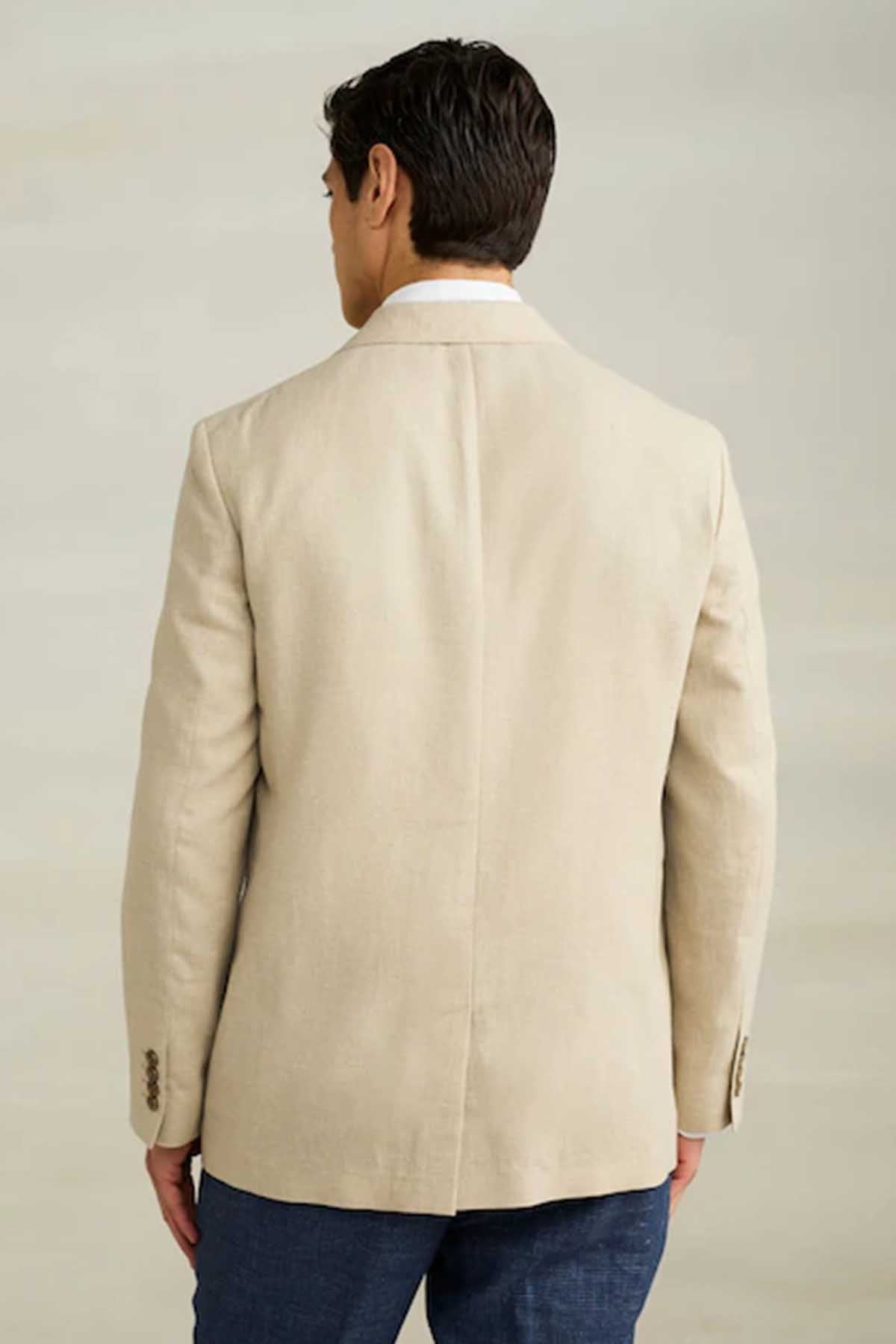 Men's stone blazer back view with center seam and rear vent