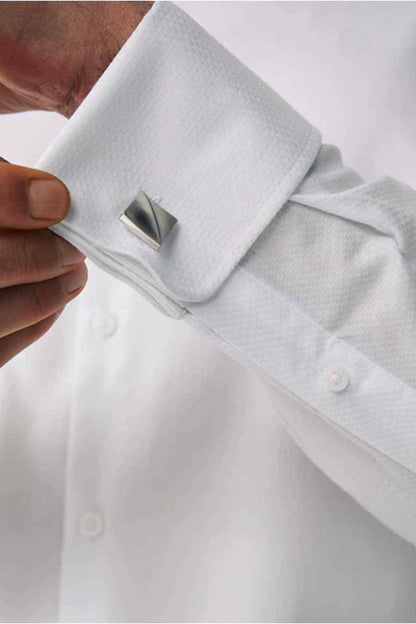 White dress shirt cuff with button and shirt front placket detail