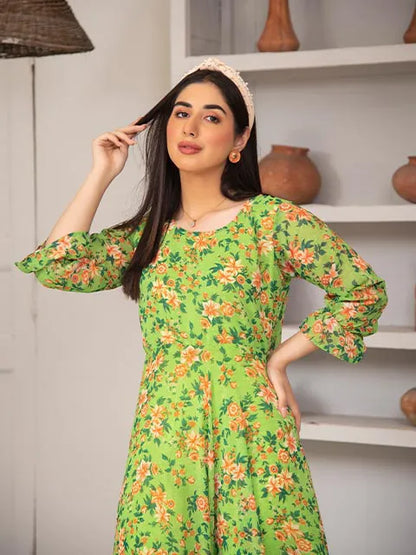 Nazmina green floral maxi dress detail: elastic neckline and ruffled sleeve hem