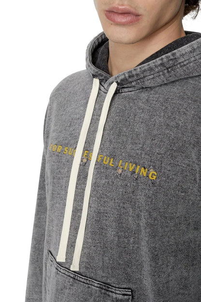Diesel grey hoodie close-up with white drawstrings and yellow graphic chest text