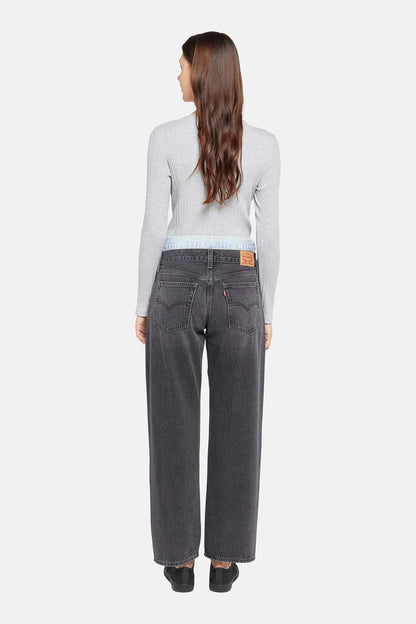 Levi's dark jeans back view with yoke and logo patch at waistband