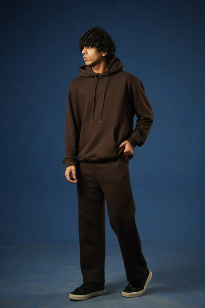Brown straight-leg pants on model, full-length front view