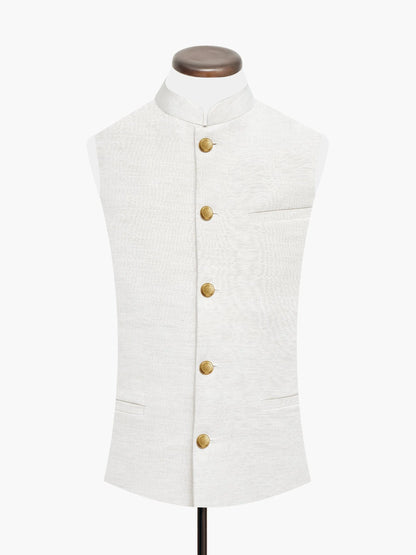 Beige linen-viscose sleeveless vest with gold buttons and front flap pocket