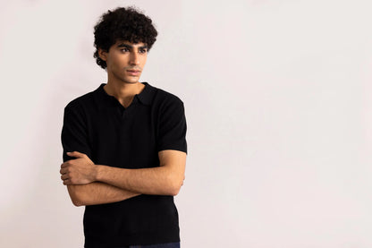 Black short-sleeve polo shirt with ribbed collar and button placket
