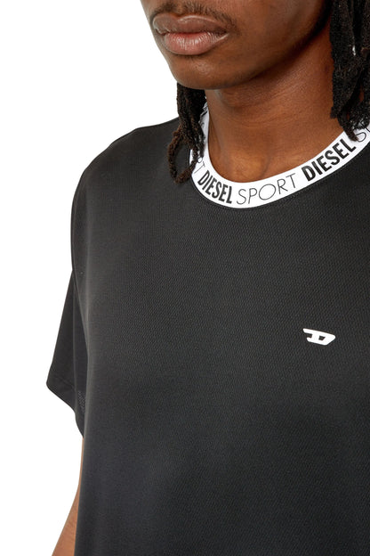 Black Diesel T-shirt close-up of logo crew neckline and small chest emblem