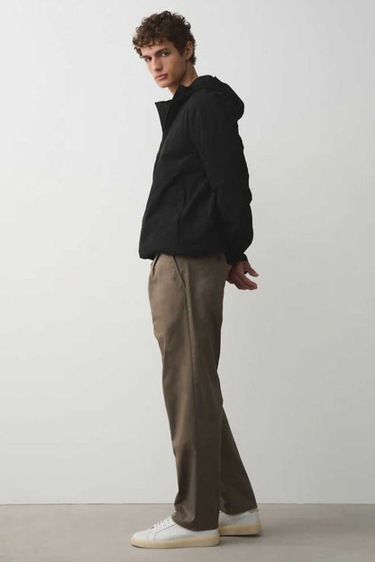 Men's sand tapered trousers with side seam pockets, side view