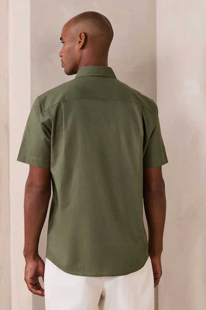 Green short-sleeve button-up shirt, back view