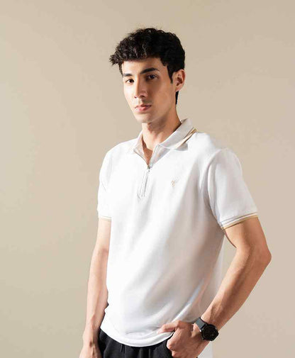 White fitted polo shirt with quarter-zip placket and short sleeves, contrast trim, chest logo