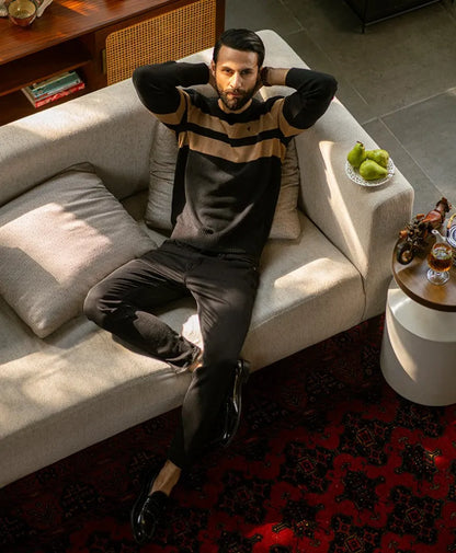 Black and tan striped sweater with ribbed crew neck and cuffs