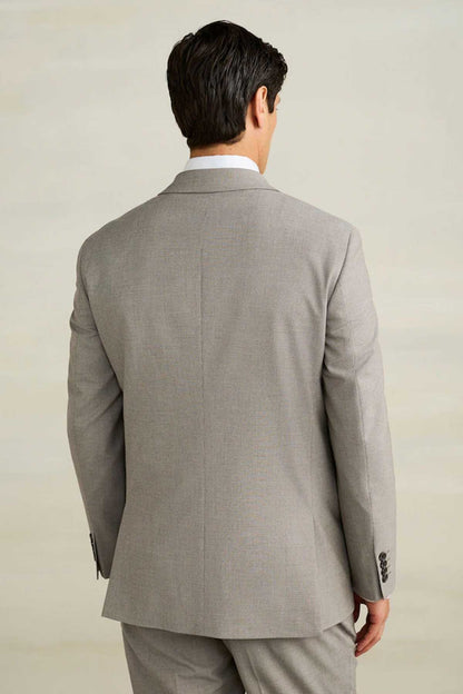 Men's light gray suit blazer back view, center seam and two-button closure.