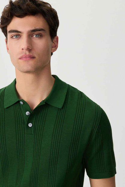 Green polo shirt chest close-up with button placket and collar
