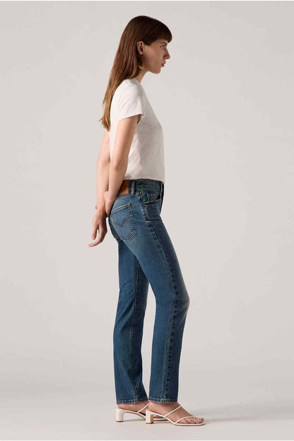 Dark indigo straight-leg jeans, side view with front pockets