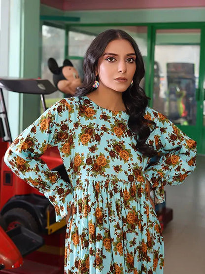 Floral maxi dress with long sleeves; teal base with orange flower print