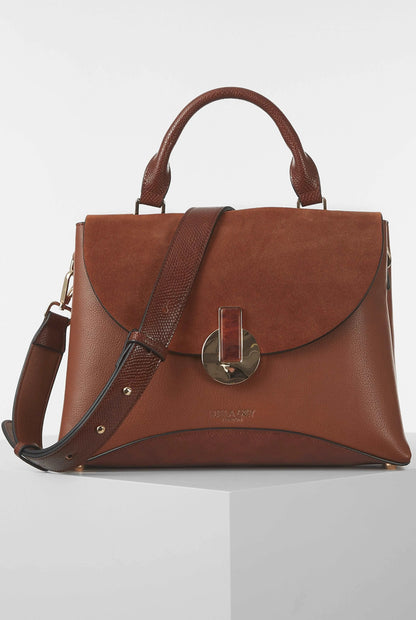 Luella Grey Pakistan brown handbag with structured flap, top handles, and adjustable strap.