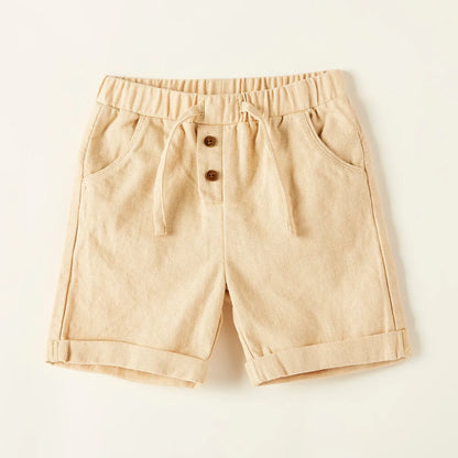 Beige baby shorts with elastic waistband, drawstring, and two button placket