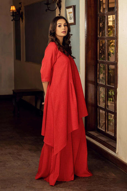 Red velour maxi dress with round neck and layered draped side panels