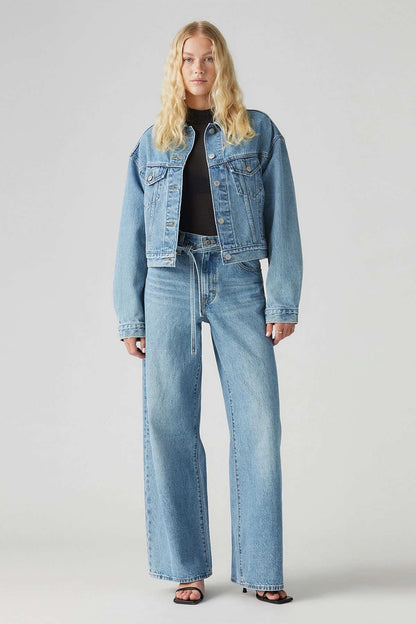 Blue denim jeans with wide legs