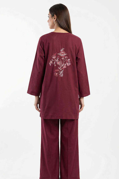 Back view of dark maroon tunic with floral embroidery and matching cropped wide-leg pants
