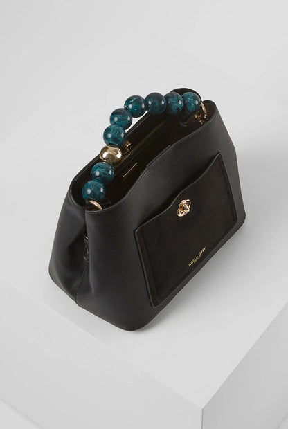 Black leather-look handbag with teal beaded handle, front pocket panel, gold clasp